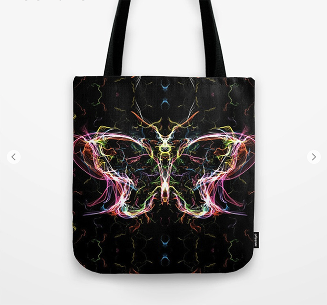 Radiant lighting butterfly Tote Bag by angeldecuir | Society6 http://bit.ly/2jJjHwo